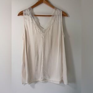 Silky camisole style top with lace trim